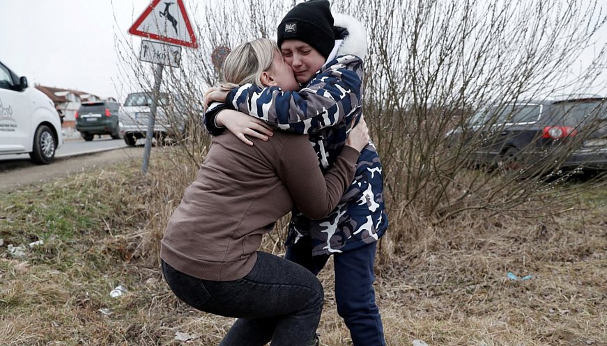 At The Ukrainian Border, A Mother Brings A Stranger's Children To Safety